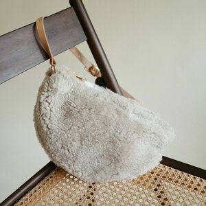 Your Bag of Holding Cream Sling Bag